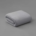Thick grey coral fleece bath towel with vertical ribbed texture and soft finish - Gray
