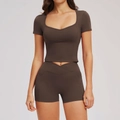 Chocolate brown two-piece yoga set with cross-waist shorts and U-neck crop top - S / Coffee