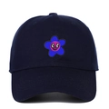 Vue détaillée de la casquette bleu marine avec broderie fleurie colorée et motif sourire - Réglable / Bleu Marine