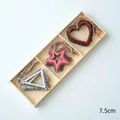 Set of 12 Nordic wooden Christmas ornaments with heart star and triangle shapes - Geometric Hollow Festival Style (13)