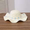 Straw sun hat in creamy beige with blue daisy flower decor and frayed brim edge - Floral Head Circumference - Creamy White