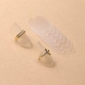 Transparent ring size adjusters in various wavy designs shown with golden pearl rings - Frosted (10 Pieces)