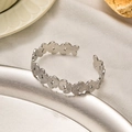 Silver stainless steel open bangle featuring elegant embossed butterfly patterns for women - Silver Butterfly Pattern