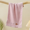 Detail of pink cotton kids towel with cute bear embroidery and Goodluck text - Embroidered Bear Head Pink