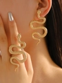 Golden snake jewelry set including large drop earrings and matching serpent ring - Gold Set