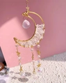 Golden moon suncatcher with amethyst beads and star charms on a soft pink background - M3-Clear Quartz