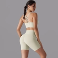 Hoge taille yoga set in crème met cross-back bh en strakke sportieve short - S / Licht Ivoor