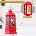 Red LED Christmas lantern with Santa Claus and reindeer graphics on a 13cm height frame - Small Red Cartoon Santa
