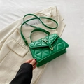 Bright green quilted leather crossbody bag with gold U-shaped buckle and top handle - Green