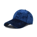 Detail of soft navy blue velvet baseball cap showing embossed texture and curved brim - Adjustable / Sapphire Blue