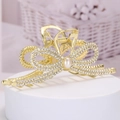 Elegant golden bow hair claw clip with rhinestones and pearl detail for women - Gold - Bow Rhinestone