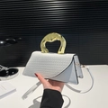 White faux-crocodile bag with asymmetrical lid and artistic gold handle - White