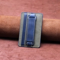 Leather phone card holder with wrist strap in blue and grey patchwork finish - Gray Blue