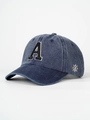 Detailed close-up of embroidered letter A and side logo on washed navy baseball cap - Navy Blue