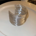 Detail shot of a silver wide cuff bracelet featuring a unique multi-wire layered texture - 11# Bangle-Silver