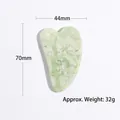 Light green Xiuyan jade heart-shaped Gua Sha tool measuring 70x44mm for facial massage - Heart / Banded Green White
