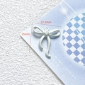 Detailed view of sea salt blue bow charm with dimensions 25mm by 22.5mm for DIY crafts - 37# Large White Bow