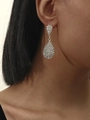 Elegant silver teardrop earrings featuring sparkling rhinestones on a female model - Silver Teardrop Rhinestone Long Style (DTE1316419S)