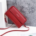 Deep red crossbody phone bag featuring a decorative tassel and Forever Lovely text - Burgundy