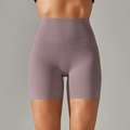 High-waisted dusty purple yoga shorts with a wide waistband and seamless stretch design - Taupe