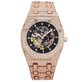 Detail of rose gold iced-out mechanical watch with skeleton dial and crystals - Rose Gold