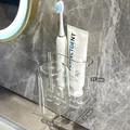 Wall-mounted double toothbrush holder set with transparent cups and compact dimensions - 2 Pieces Set - Transparent