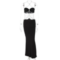 Close-up of silver metal body chain detail on a black hollow out cutout dress - S / Black
