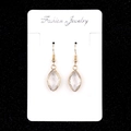 Elegant gold faceted amethyst marquise earrings on fashion jewelry display card - White Crystal