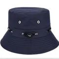 Dark blue cotton bucket hat featuring breathable metal eyelets and adjustable sport drawstring - Adjustable / Blue