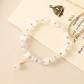 Exquisite beaded bracelet with white glass beads, faceted crystals and a golden butterfly charm - White Crackle + White Bodhi Style (K3514)