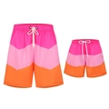 Men and kids matching swim shorts in pink and orange color block design with white drawstrings - Pink Pink Orange / 104