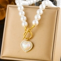 French vintage pearl necklace with golden OT buckle and iridescent heart pendant on jewelry box - Heart Pearl Necklace (N2855)