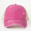 Close-up of distressed rose pink ponytail baseball cap with mesh back and torn details - One Size / Rose Red