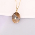 Detail of tear-drop shaped grey gemstone pendant with gold star on stainless steel chain - Brown-grey Faceted Hexagram (10#)