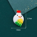 Cartoon snowman resin DIY accessory with red hat and dimensions 2.7cm by 1.8cm - Snowman