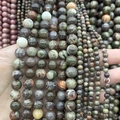 Naturkristallperlen für DIY-Schmuck in Erdtönen, von einer Hand gehalten - 4mm (ca. 88 Perlen) / Blumenachat A235