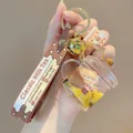 Portachiavi bubble tea con orso giallo e cinturino in silicone marrone e campanello - Tè al Latte dell'Orso - Forma di Tazza Mug