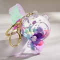 Transparent bear keychain with liquid sand, colorful beads and a gradient silicone strap - Gradient Strap + Bear / Purple