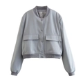 Flat lay of light blue bomber jacket featuring large utility pockets and button closure - S / Light Gray