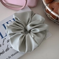 Oversized sage green satin scrunchie with soft fabric folds for a French ballet style - Matte Green