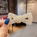 Elegant bow-shaped pearl hair clip featuring woven white pearls for women's hairstyling - 15# Pearl Hollow Bow Clip