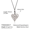 Detailed view of silver heart pendant on black cord showing size and stainless steel texture - Silver Heart Style (YYN025283-P)