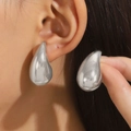 Polished silver asymmetrical teardrop earrings in a large liquid metal design - Silver Polished Large Drop