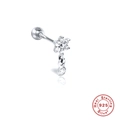 Close-up of S925 sterling silver flower labret stud with a dangling round cubic zirconia - Style 20 (Single) - Flower Dangle