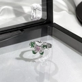 Detail of a silver butterfly ring with green enamel wings and a pink gemstone - Silver Green Enamel Pink Gem Butterfly Style (4)