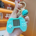 Mini handheld Tetris game console keychain in mint green with matching bell - Green Controller Style Game Console