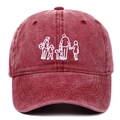 Close-up of white silhouette embroidery on vintage washed burgundy cotton baseball cap - Burgundy