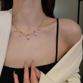Elegant gold chain necklace featuring multiple dangling white pearls on a female model - Gold Pearl Multi-Layer (37#)