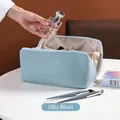 Sky blue large capacity leather makeup bag with gold logo for travel storage - Sky Blue