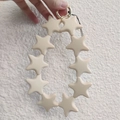 Cute beige star-shaped silicone keychain with golden clasp on white plush fabric - Beige (Straw Yellow) (10 Stars)